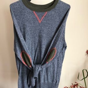 Blue sweater with unique elbow stitching!
